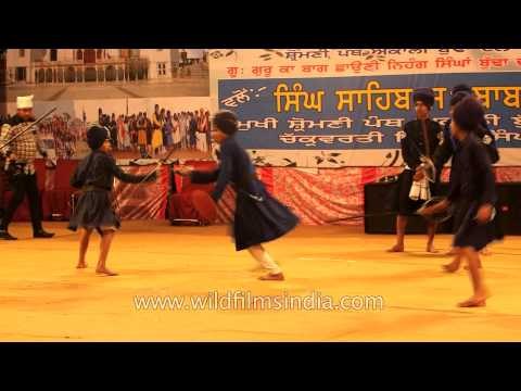 Young Nihang trainees perform Gatka martial arts, Punjab