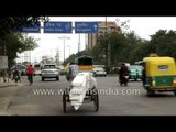 Delhi traffic at Maharani Bagh Ring Road: auto and cycle rickshaws