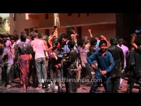 Indians play with colours during Holi festival