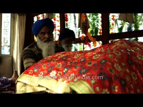 Sikh priests with holy book 'Guru Granth Sahib' : Procession of Hola Mohalla, Punjab