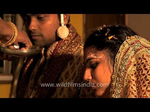 Newly wed couple being blessed by relatives : Bengali wedding