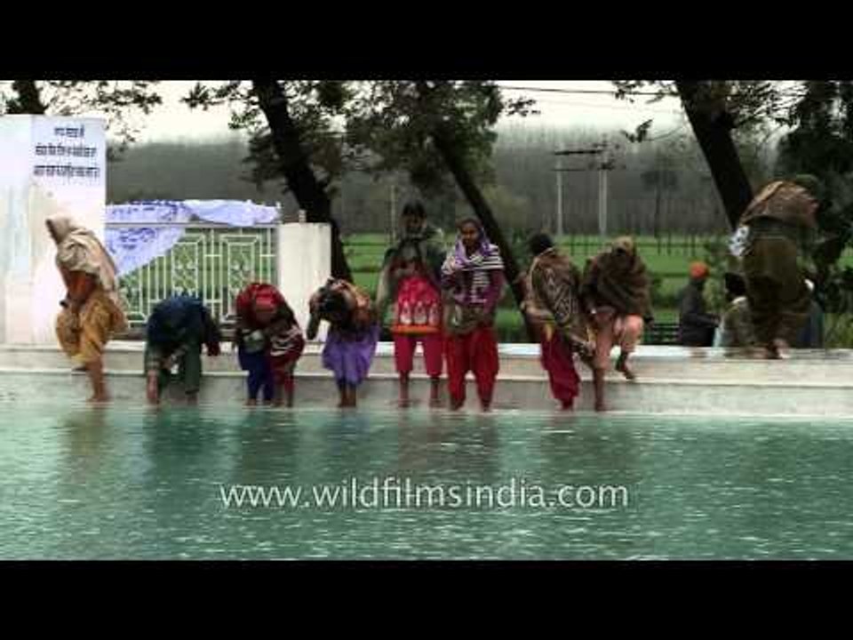 Sikh devotees take a holy dip at Patalpuri Sahib Gurudwara, Punjab