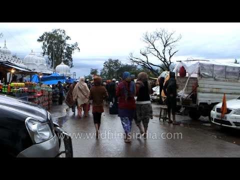 Sikh pilgrims outside Baba Guru Dutta Gurudwara, Punjab