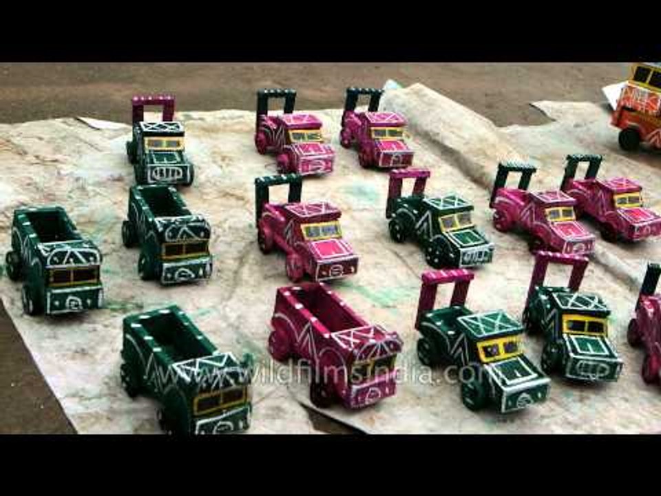 Wooden toy trucks on sale outside Dargah Peer Sai Baba Budhan Shahji