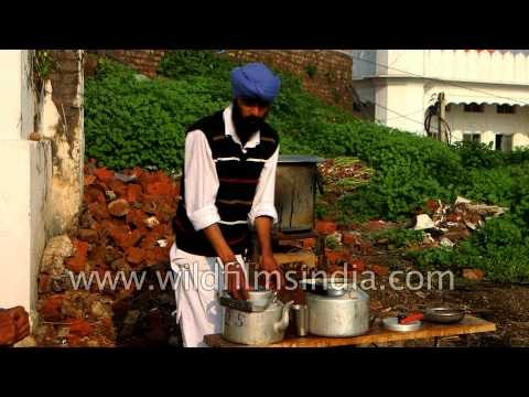 Tea being served to devotees at Takht Sri Keshgar Sahib, Punjab