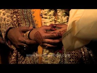 Anjali - an offering made to fire god at Bengali wedding