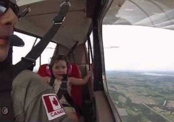 Four-Year-Old Girl Enjoys Dad's Spectacular Aerobatic Maneuvers