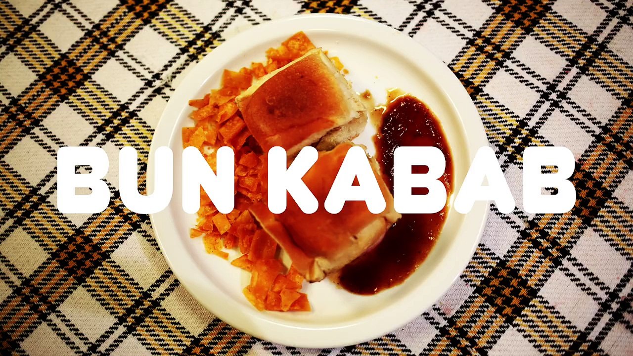 Watch our staff taste-test famed Pakistani bun kababs. Totally yumalicious!