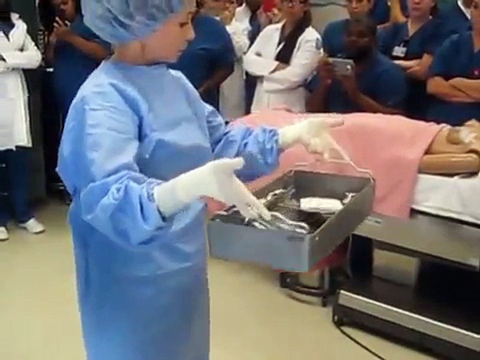 Surgical Technology Gowning, Gloving, and Setting up Mayo video