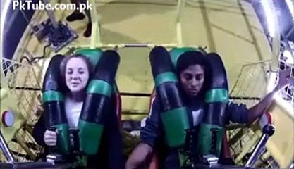 Terrified Boy with Girlfriend on Roller Coaster