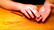 Magic Tricks Revealed: Pencil Tap Coin Vanish