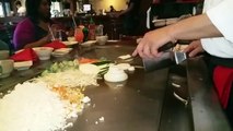 Japanese restaurant food on fire slow motion