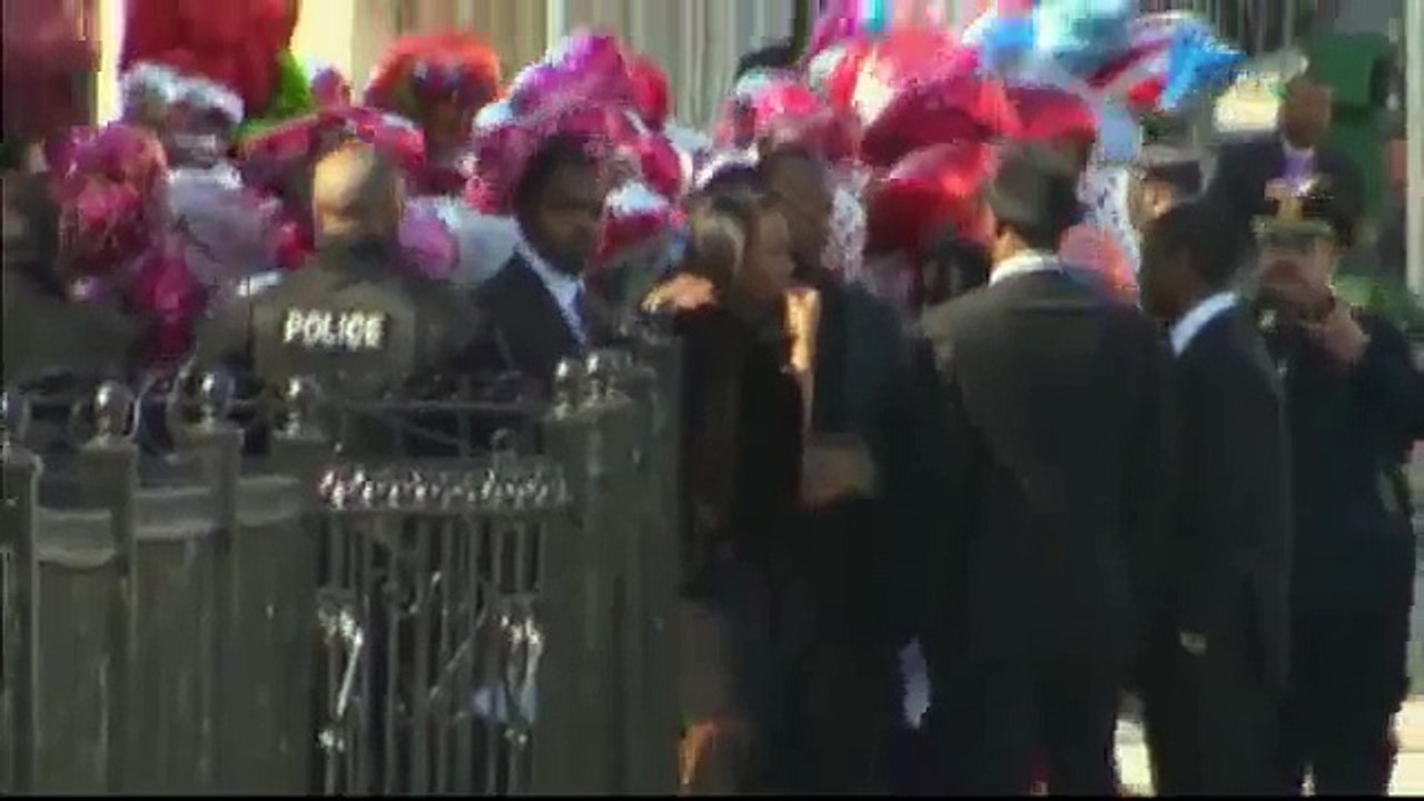 Whitney Houston Funeral - Bobby Brown comforts friend at funeral