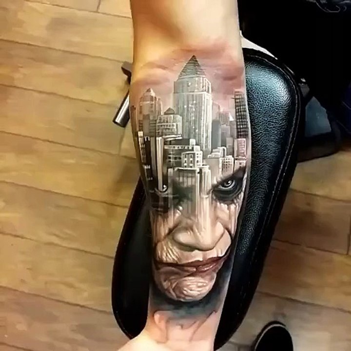 Amazing tattoo work London city and a face