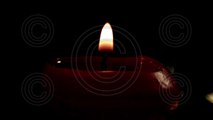 Candle Close-Up on Black Background - Royalty-Free Stock Footage