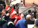 NH: Angry mob swarms Rick Santorum
