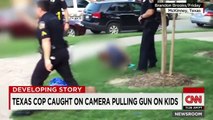 Texas cop caught on camera pulling gun on kids
