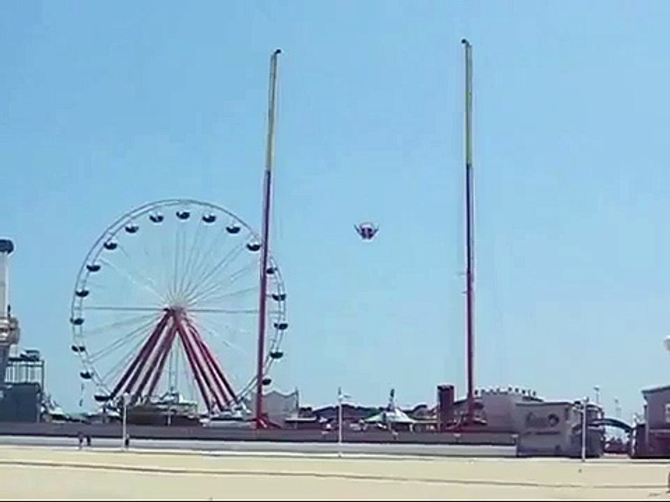 Slingshot ride on the boardwalk pier in Ocean City, MD.