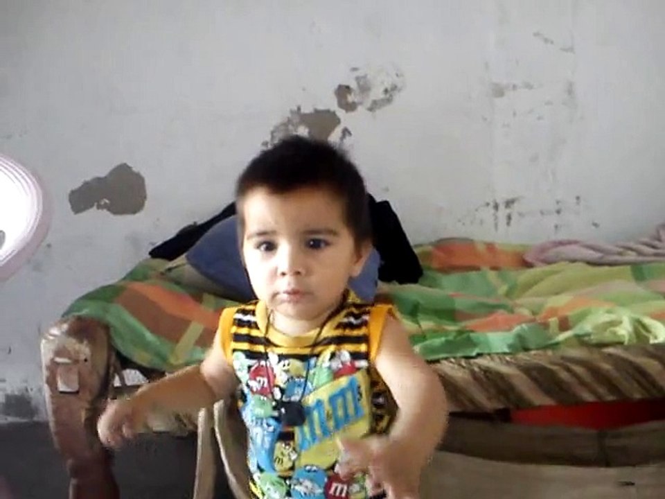 little baby is scared from bird bt also he is sying to bird come come come