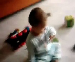 Cute Korean-American boy smiles for grandma