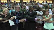 'We Shall Overcome' rings out at Charleston vigil