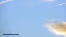 Aerosol Spraying Jet Nearly Collides With Oncoming Aircraft