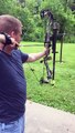 Cody shooting slow motion archery