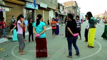 Girl's balloon bursting competition