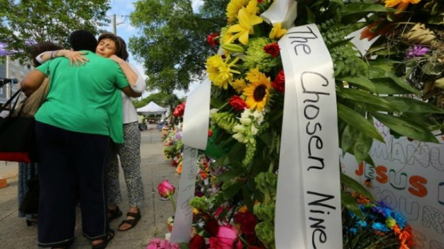 Mourners sing and pray during vigil