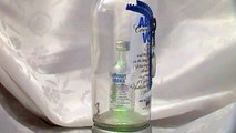 Glass Bottles Cutting Art - ABSOLUT VODKA is Pregnant....