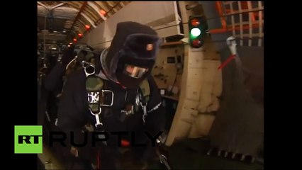 Daredevil Drills: Russian paratroopers land on drifting ices in Arctic Ocean