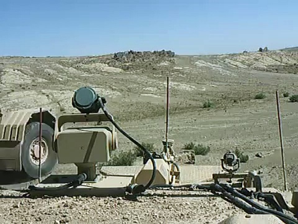 Husky in front hits an IED