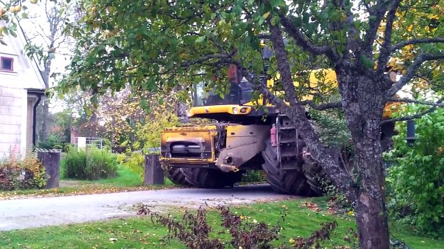 One big combine harvester New Holland CR9080 Elevation