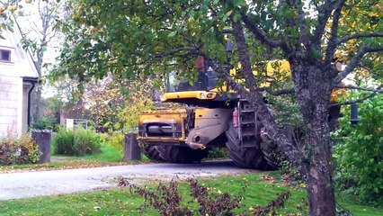 One big combine harvester New Holland CR9080 Elevation