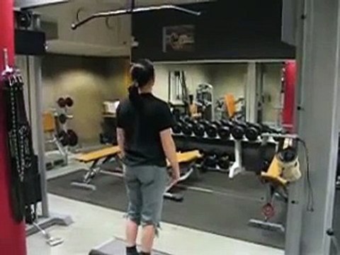 Girl doing 16 pullups (properly)