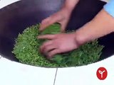 Hand Processing of Bi Luo Chun green tea on Golden Mountain