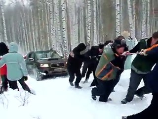 Forester uphill in deep snow