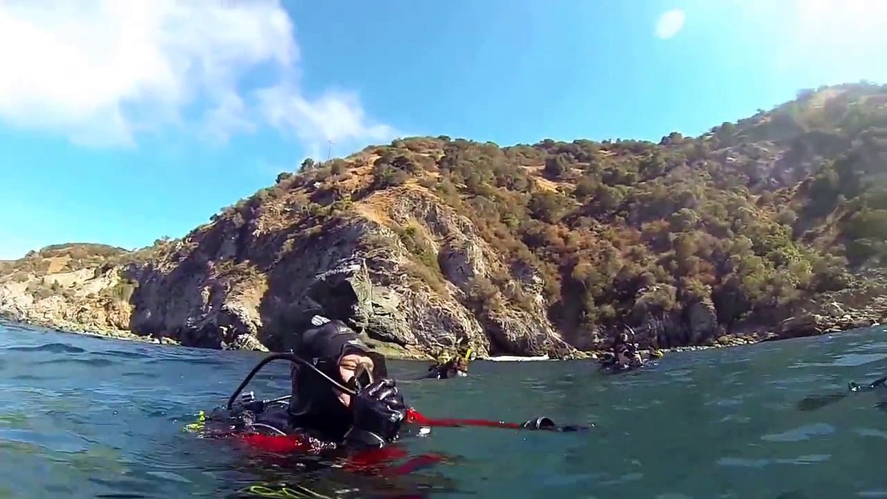 Learning to use a dry suit on SCUBA