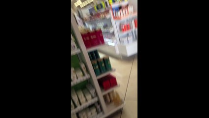 Drunk guy falls down at the mall