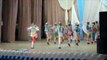 group of young children performing a dance on stage. Stock Footage