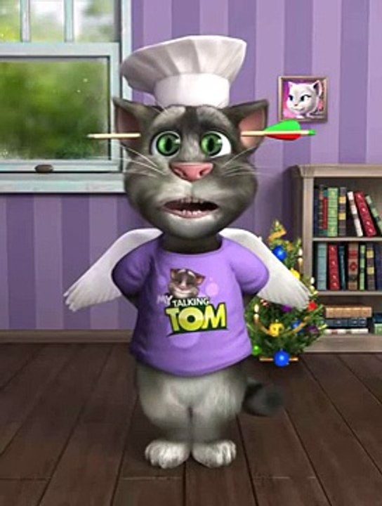 Tom le chat qui chante petit papa noel