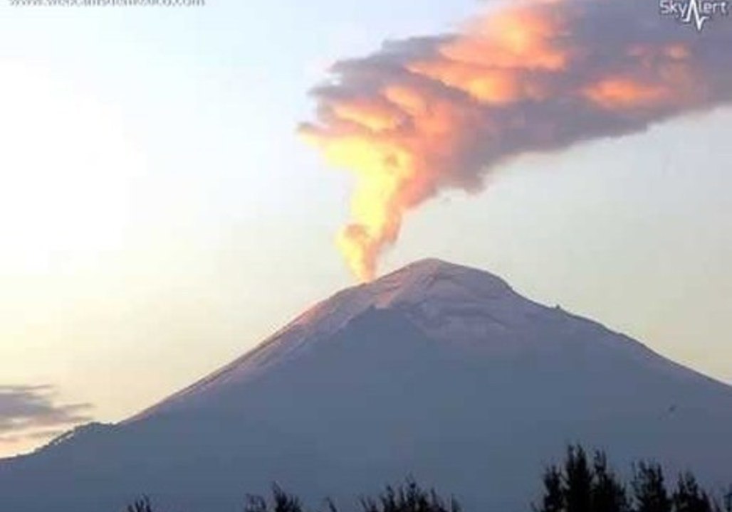 Mexico's Popocatepetl Sends Up Ash Plume at Sunrise