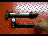 Motorcycle Repair: Adjusting the Rear Suspension Air System Shocks on a Harley Davidson