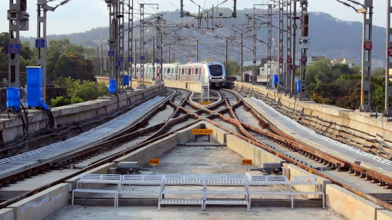 Metro train Changes tracks.