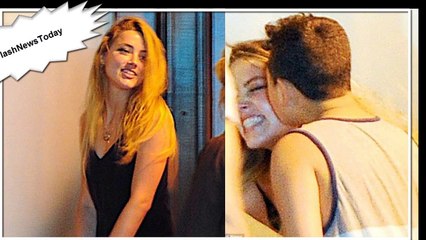 Hot News : Amber Heard is unexpectedly kissed by overzealous male fan outside her NYC hotel.