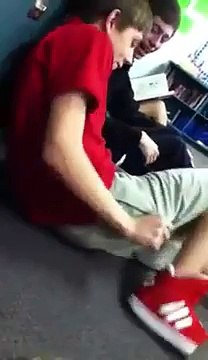 Kid takes off his pants in English class