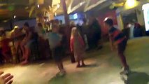 wired kids dancing in a greek resturant
