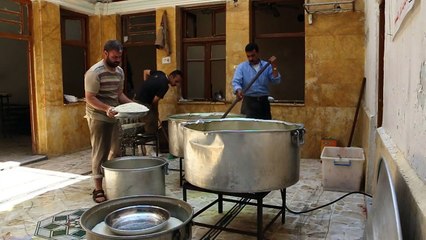A Alep, table ouverte au profit des pauvres pendant le ramadan