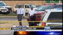 OHIO WOMEN RESCUED AFTER CAR SWALLOWED BY MASSIVE SINKHOLE WEDNESDAY (JULY 3, 2013)