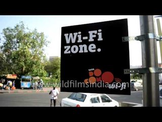 DoCoMo Wi-Fi on the streets of New Delhi: youngsters mill around CP